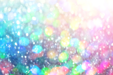 Christmas New Year colorful defocused pastel background with snowflakes and blinking stars.