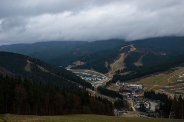 Naklejka premium Autumn landscape background in the rain weather with fog