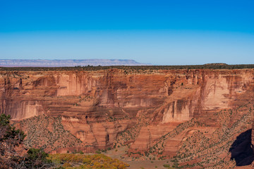 Fototapeta na wymiar View of red stone canyon at Canyon de Chelly National Monument in Arizona