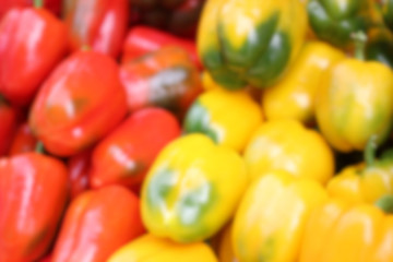Blur of Colorful sweet bell peppers red, yellow, green. Nature background.