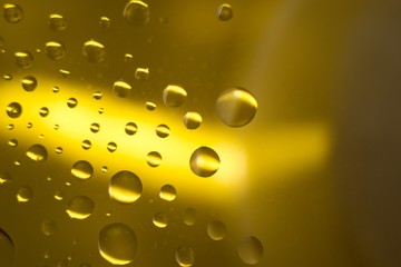 Fototapeta na wymiar Biodiesel, bubbles biofuel, vegetable oil, yellow and orange emulsion bubbles background