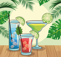 tropical cocktails over tropical leaves and retro style background