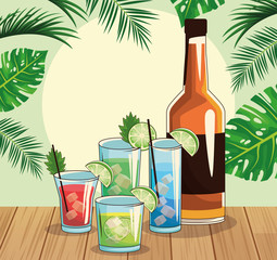 whisky bottle and tropical cocktails over tropical leaves and retro style background