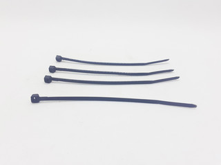 Plastic Black Ties Wire Cable for Effectively Fasten Mechanical Industrial Computer Electronic used in White Isolated Background 