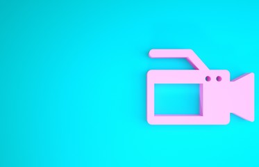 Pink Cinema camera icon isolated on blue background. Video camera. Movie sign. Film projector. Minimalism concept. 3d illustration 3D render