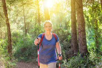 Woman hiking in forest