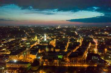 Fototapeta na wymiar above the roofs on sunset. old european city. Ukraine Lviv