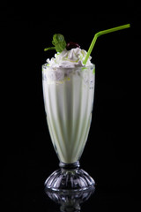 creamy milkshake in a glass