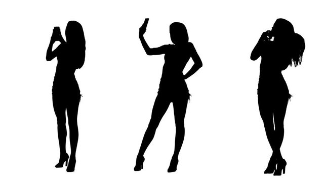 Silhouettes of young sexy women taking photos, selfies and talking on the cell phone isolated on white background. 