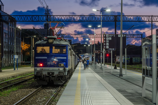 KOLOBRZEG, WEST POMERANIAN / POLAND - 2018: An express train at the railway station stands at the platform ready for departure