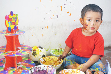 Asian boys one year and three months playing color mixing activities artist concept.