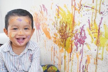 Asian boys one year and three months playing color mixing activities artist concept.