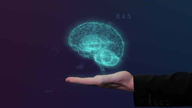 Digital brain hologram appears above male hand in black suit with hud background 02