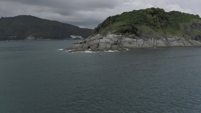 Nayaking in blue Sea ner Phuket Island in Thailand, 4K Drone flight