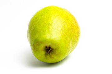 Green pear on a white background. close up