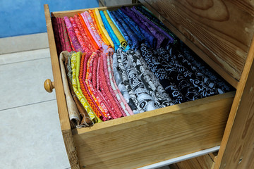 Collection of traditional and modern batik cloth in a drawer