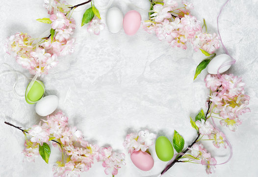 Easter frame with flowers and Easter eggs