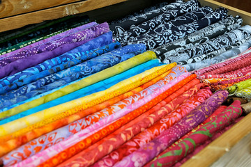 Collection of traditional and modern batik cloth in a drawer