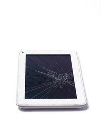White tablet computers with broken display on isolated white background.