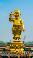 Golden Sculpture of Lord Buddha as baby in Lumbini, Nepal