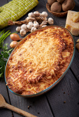 Homemade cheese pie with potatoes and meat