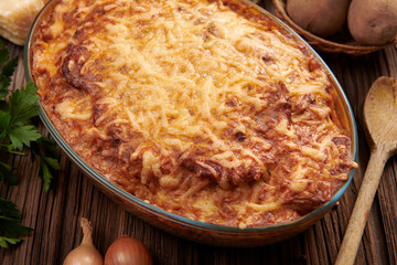 Homemade cheese pie with potatoes and meat