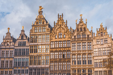 Fototapeta na wymiar Gabled golden facades of house row in Antwerp