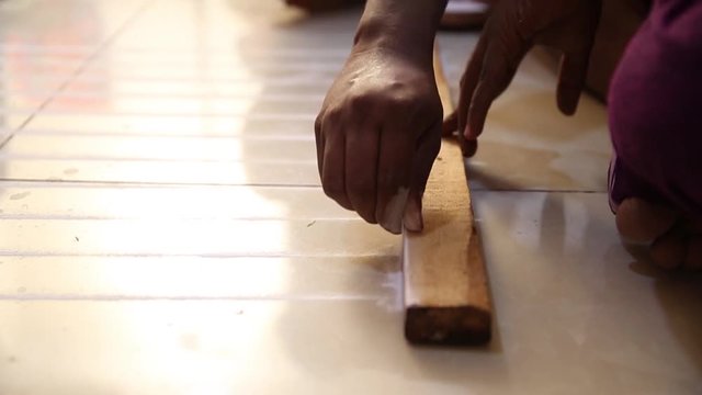 Rangoli created using wood and measurements