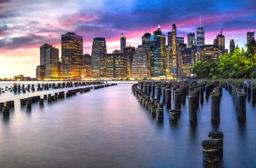 Lower Manhattan as seen  at sunset from Brooklyn Bridge Park in DUMBO, New York City. 