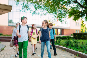 Group of kids going to school together.