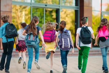 Group of kids going to school together. © davit85