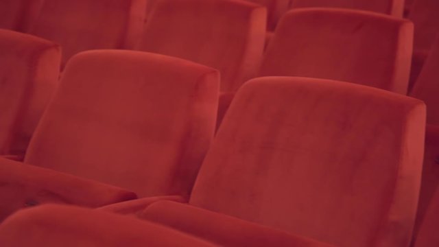 course of blank movie seats Empty theater hall. Rows of empty armchairs seats in cinema theatre Red seats before movie. Movie entertainment concept