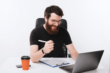 Business concept, photo of working man, doing his paper work and checking results