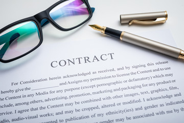 Business contract and pen.