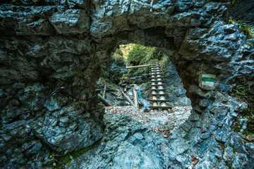 Hiking trail in Sucha Bela gorge in Slovensky raj National park, Slovakia