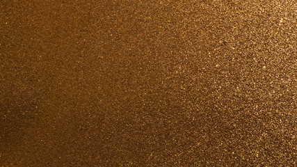 Fototapeta na wymiar Dark gold glitter texture background special for Christmas