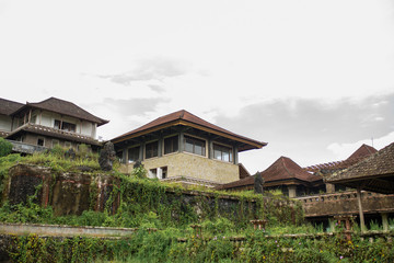 Balinese architecture, a huge complex of buildings overgrown with plants