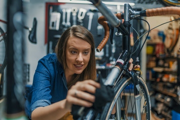 Fototapeta na wymiar Women wipes bicycle