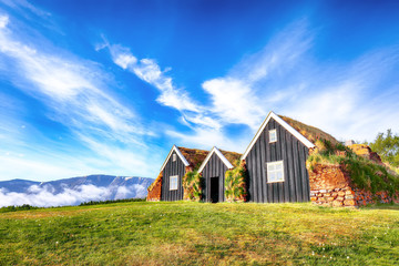 Fototapeta na wymiar Traditional Icelandic turf houses in the town of Holar