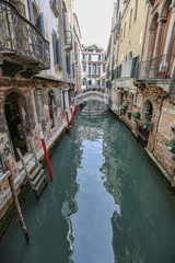 Obraz na płótnie Canvas The colorful landscape of a historic city on the water. Venice, Italy