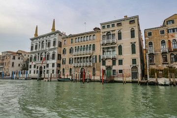 Fototapeta premium The colorful landscape of a historic city on the water. Venice, Italy