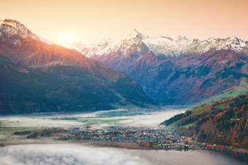 Spectacular autumn view of lake meadows trees and mountains in Sell Am See © pilat666