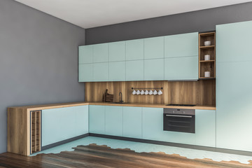 Blue and gray kitchen corner with countertops