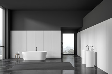 Fototapeta na wymiar Black and white bathroom, tub and sink