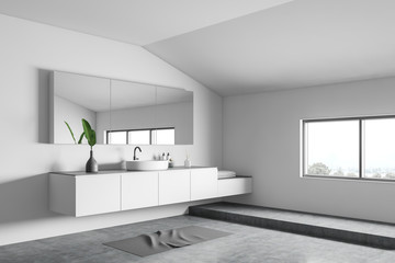 White bathroom corner with sink and mirror