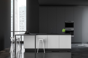 Spacious gray kitchen with white bar