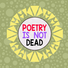 Conceptual hand writing showing Poetry Is Not Dead. Concept meaning aesthetic and rhythmic writing is still alive and modern Asymmetrical uneven shaped pattern object multicolour design
