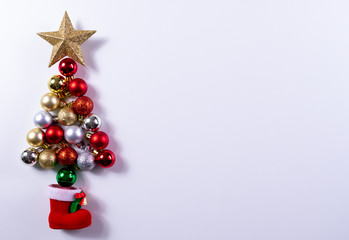 Christmas tree made of bauble decoration with copy space. Christmas or New year concept.