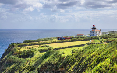 Fototapeta na wymiar Ponta da Ferraria lighthouse on Sao Miguel Island, Portugal