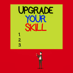 Handwriting text Upgrade Your Skill. Conceptual photo Expand Scope of Knowledge Optimize Skills Craft Isolated view young man standing pointing upwards two hands big rectangle